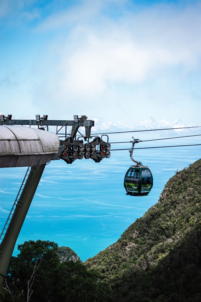 A Langkawi SkyCab cable car crossing above the sea