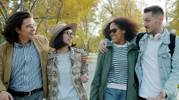 A group of friends walking together on campus