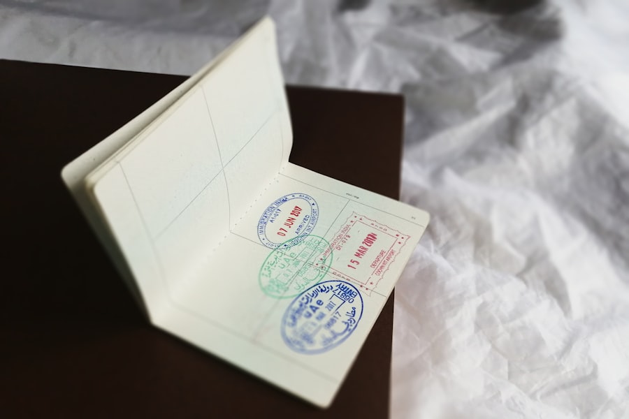 Passport open to a page with visa entry and exit stamps